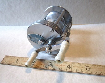 AW69: Hurricane Olympic Totem No. 727 Old Vintage Casting Fish Reel Like  New 