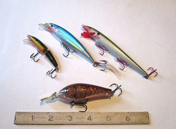 TU100 See the VIDEO! 4 uncommon Rapala.! odd, unusual old fishing lures! Fish em (?), but these may be for the collector! Gotta see these! TU100 See the VIDEO! 4 uncommon Rapala.! odd, unusual old fishing lures! Fish em (?), but these may be for the collector! Gotta see these!
