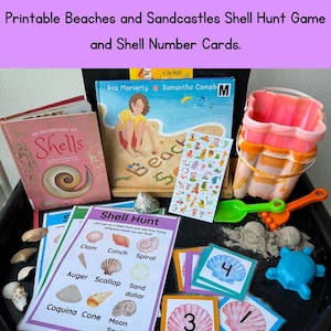 May include: A collection of beach-themed educational materials, including books, shell identification cards, number cards, a sand pail, and a toy shovel. The image features the text "Printable Beaches and Sandcastles Shell Hunt Game and Shell Number Cards."