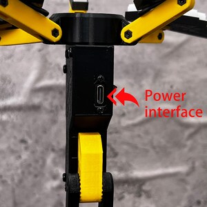 This 3D printed LED lamp inspired by Death Stranding is perfect for any fan of the game looking to enhance their gaming space. Its unique folding design allows for easy storage and travel, while the adjustable arms and joints give you control over the lamp’s position. The warm LED light emitted from this lamp is ideal for setting the right mood, whether you're gaming, reading, or just relaxing. The durable PLA plastic construction ensures that the lamp will hold up over time