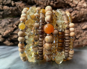 Apricot Stardust: Nine tiers. Stacked wood, gemstone, crystal fragrance diffuser bracelet. Memory wire. One piece. Fits anybody.