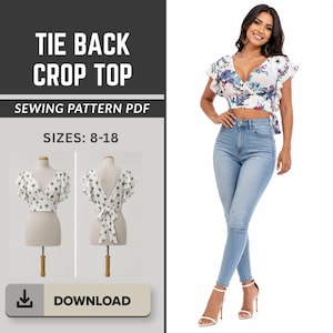 May include: A tie back crop top sewing pattern PDF in sizes 8-18. The top is white with a blue and pink floral print, featuring a V-neckline and ruffled sleeves. The design includes a tie back closure, shown on a mannequin and a model.