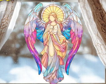 May include: A stained glass angel window hanging with a halo and large, colorful wings. The angel is depicted in a flowing gown with hands clasped in prayer. The text "2D FLAT ONLY" is in the upper left corner. The text "MATERIALS: ACRYLIC" is in the lower right corner.