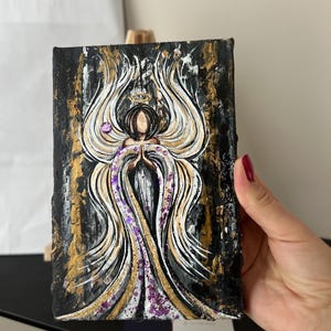 Cuadro en lienzo "Ángel de la Guarda" - acrílico, barniz protector, incluye caballete y cuaderno de deseos, regalo perfecto para bautizos y seres queridos.