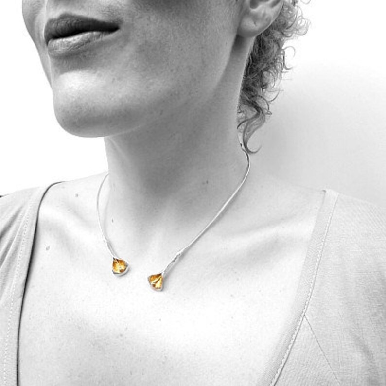 Two medium Calla-Lilies torque necklace with gold leaf by CARLOS TELLECHEA