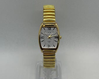 Vintage Royal Tel-time Quartz Gold & Silver Stretch Watch - Etsy display picture 1