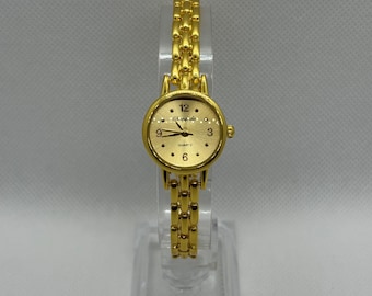 Vintage dameshorloge van goud - elegante ovale schakelarmband - minimalistische gouden wijzerplaat, chique retrostijl