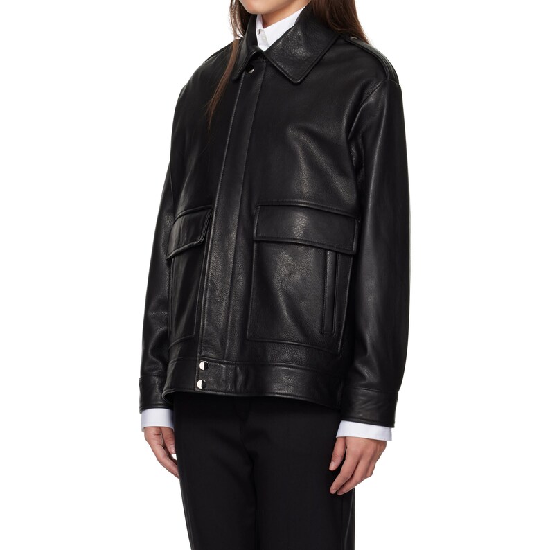 Discover the perfect blend of style and comfort with our oversized women's leather jacket. Made from luxurious, soft leather, this trendy jacket features a relaxed, oversized fit, ideal for layering. Whether you're dressing up for a night out or keeping it casual, its versatile design complements any outfit. A timeless addition to your wardrobe, offering both warmth and edge. Perfect for fall and winter, and a great gift for fashion enthusiasts. Shop now for quality and style!