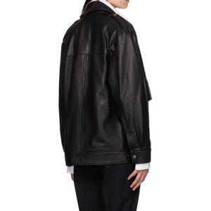Elevate your style with our oversized women's leather jacket, designed for comfort and fashion. Made from high-quality leather, this chic jacket features a relaxed, loose fit for a laid-back yet stylish vibe. Perfect for layering over your favorite outfits in cooler weather. With its timeless design, this jacket offers both versatility and durability. Whether for casual outings or a night out, this must-have piece adds an edgy touch to any wardrobe. Ideal gift for fashion-forward women.