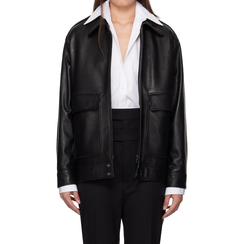 Shop our oversized women's leather jacket, crafted from soft, premium leather for a chic, comfortable fit. This trendy vintage-inspired outerwear is perfect for layering in fall and winter. Its relaxed, oversized design offers a casual yet stylish look, making it ideal for everyday wear. Versatile and cozy, this leather jacket is a must-have wardrobe staple. Perfect for fashion lovers seeking edgy, timeless pieces to elevate their outfit. Great gift idea!