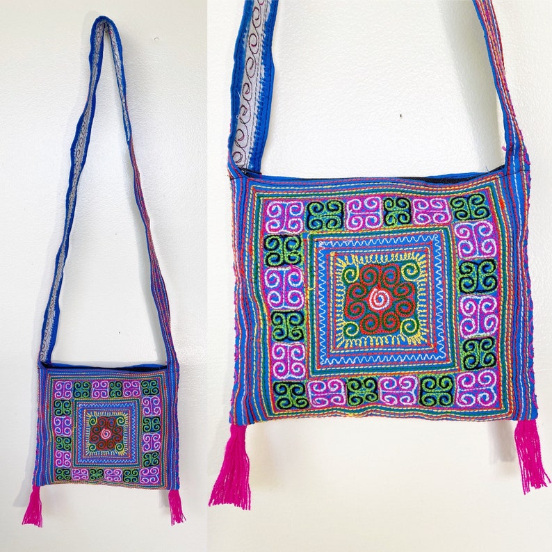 Thai embroidered cross body purse with zipper and fringe pink and blue colorful stitching zipper closure