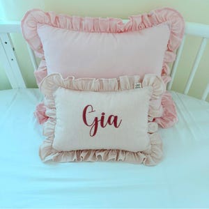 Custom embroidered baby name cushion in soft linen