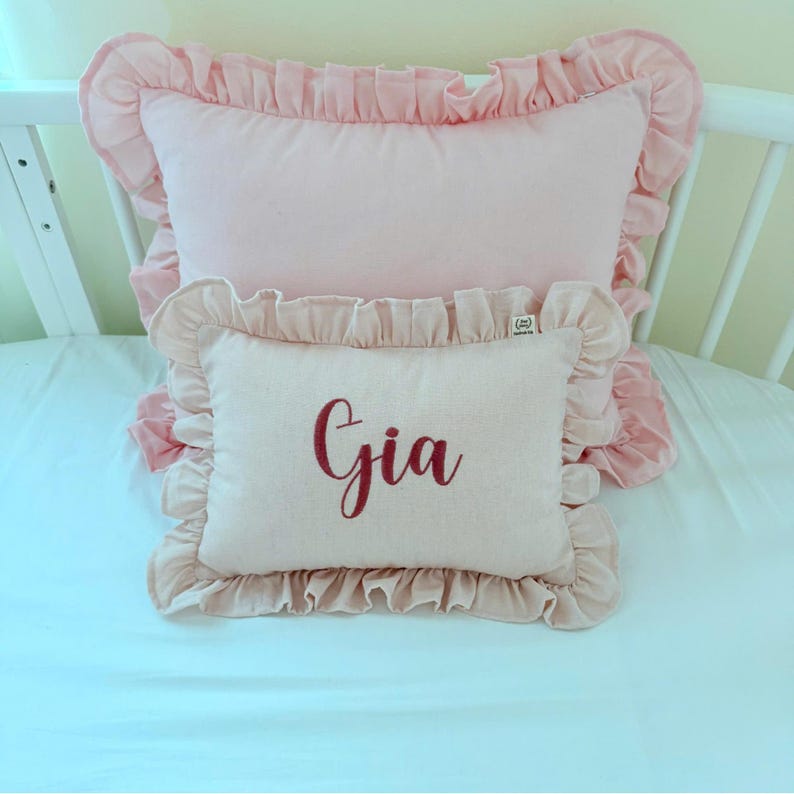 Custom embroidered baby name cushion in soft linen