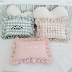 Personalized baby pillow with ruffle trim and embroidered name