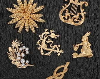 Bijou alliage doré broche feuillage cristal bleu brooch