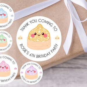 May include: A selection of circular stickers with a charming dumpling illustration. Each sticker displays the text "Thank You Coming To Rosie's 6th Birthday Party". The dumplings are in shades of blue, green, pink, and yellow.