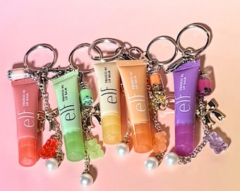 Llavero con colgante de bálsamo labial, accesorio para bolso o mochila, ideal como detalle para fiestas infantiles, cesta de Pascua o regalo de agradecimiento para la profesora.