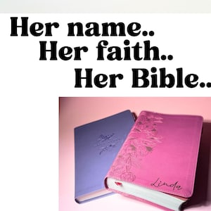 May include: A stack of five Holy Bibles in various colors including light gray, light pink, bright pink, brown, and purple. The books feature gold-edged pages and index tabs. One pink Bible is personalized with the name Linda in cursive script.
