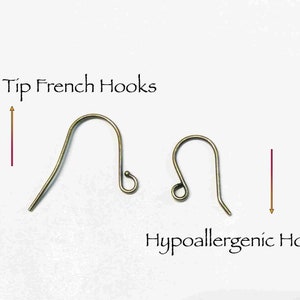 May include: Two types of earring hooks. The hook on the left is a ball tip French hook. The hook on the right is a hypoallergenic hook.