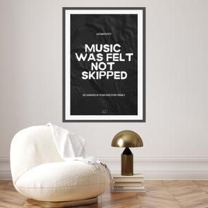 May include: Black and white poster with the text "Music was felt not skipped" and the words "Authenticity" and "No legends in your discover weekly".