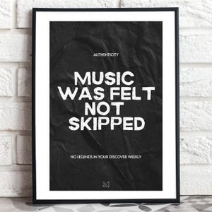 May include: Black and white poster with the text "Authenticity Music Was Felt Not Skipped" and the text "No Legends In Your Discover Weekly" at the bottom. The poster has a crumpled paper effect.