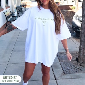 A Bride In A Tini Bit Baby Tee, Dirty Martini Themed Bachelorette Party Shirt, Dirty Martini Bachelorette Tees, Bach Comfort Colors® Shirts