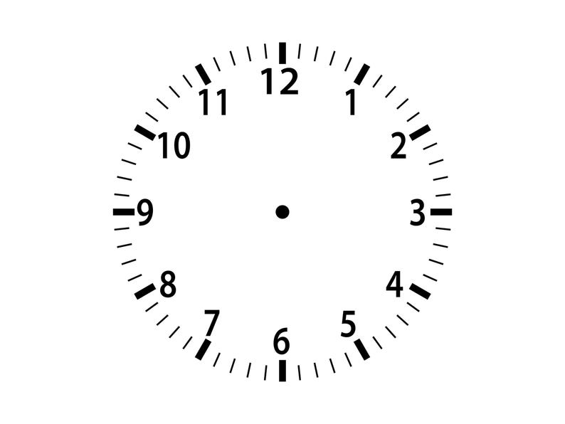 May include: A white clock face with black numerals and minute markers. The numbers 1 through 12 are evenly spaced around the perimeter. A small black dot is in the center. The clock face is a simple, minimalist design.