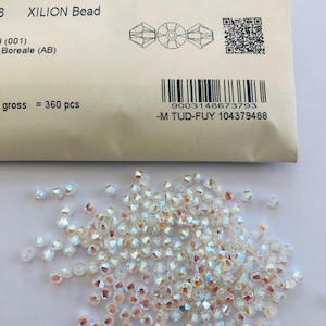 100 st. äkta Swarovski® 4 mm 2XAB kristall Bicone-pärla 5328 Craft