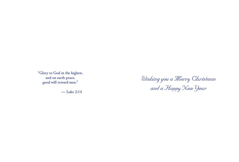 May include: A white card with blue text. The text reads "Glory to God in the highest, and on earth peace, good will toward men." - Luke 2:14. The card also reads "Wishing you a Merry Christmas and a Happy New Year".