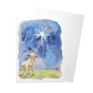 May include: A watercolor painting of a white sheep looking up at a bright, white star in a blue sky. The sheep is standing on a green field.