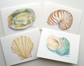 May include: Four watercolor paintings of seashells. The first painting shows a green, blue, and brown abalone shell. The second painting shows a brown and white nautilus shell. The third painting shows a yellow scallop shell. The fourth painting shows a green and yellow conch shell.