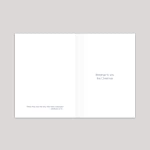 May include: A white card with blue text. The text reads "When they saw the star, they were overjoyed." - Matthew 2:10. The card also reads "Blessings to you this Christmas".