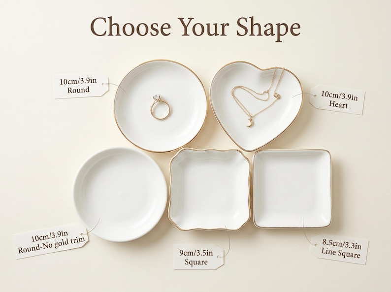 May include: White ceramic jewelry dishes in various shapes: round, heart, square, and a square with a wavy edge. Some have gold trim. The round dish is 3.9 inches in diameter. The heart dish is 3.9 inches wide. The square dish is 3.5 inches wide. The text "Choose Your Shape" is at the top.