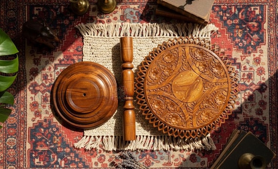 A solid wood, handcrafted round coffee table that ships as actual furniture — the kind of piece a maker built in their shop, not a factory floor.