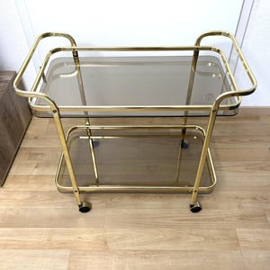 Vintage Brass Bar Cart with Smoked Glass Shelves, Hollywood Regency Style, 1970s