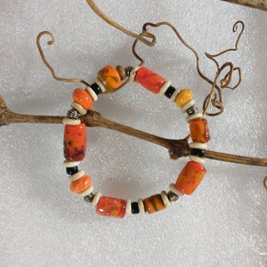 Orangenmarmelade, Butterscotch & Elfenbeinfarbenes Lampwork Perlenarmband.