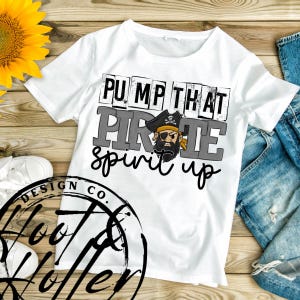 May include: White t-shirt with a black and gray graphic that says "Pump That Pirate Spirit Up". The graphic features a cartoon pirate with a black eye patch and a gold earring.