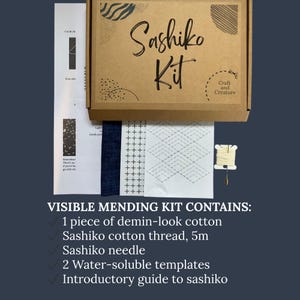 May include: A Sashiko Kit in a brown box with the text "Sashiko Kit" and "Craft and Creature". The kit includes denim-look cotton, 5m cotton thread, a needle, water-soluble templates, and an introductory guide. The kit is for visible mending.