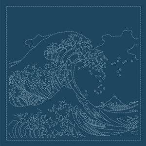May include: A square fabric panel in deep blue featuring a white dashed-line embroidery design of a large cresting wave. The pattern includes stylised foam droplets and a small mountain peak in the background, all outlined with simple running stitches.