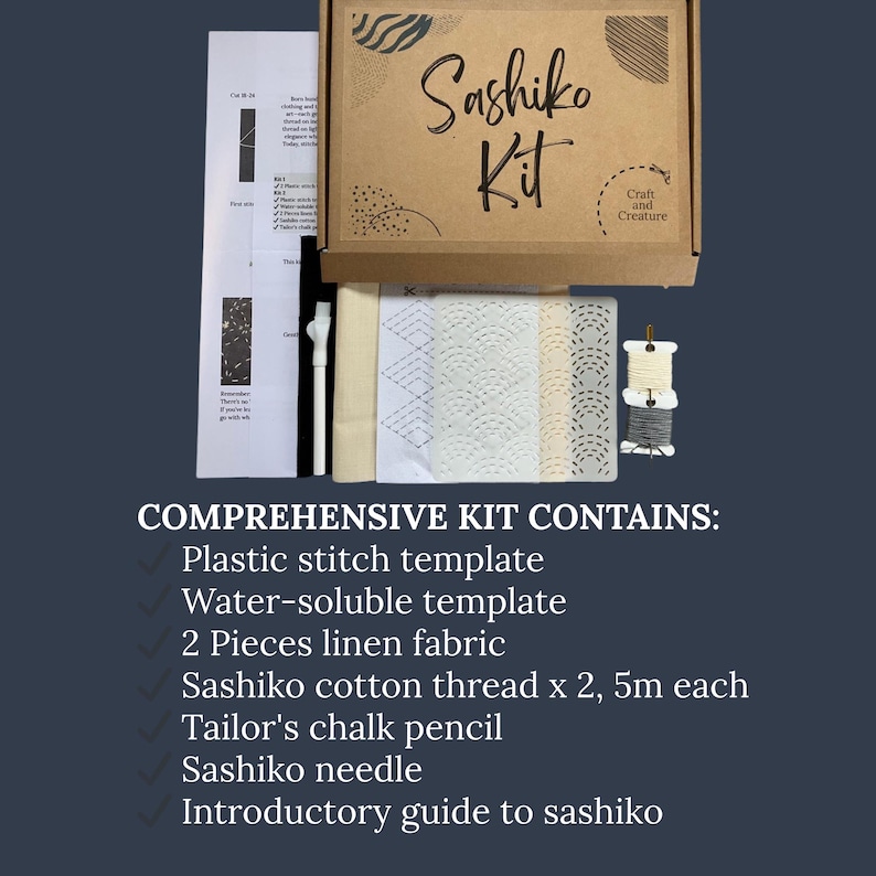 May include: A Sashiko Kit in a brown box with the text "Sashiko Kit". The kit includes linen fabric, thread, a needle, a chalk pencil, and a guide. The kit also includes a plastic stitch template and a water-soluble template.