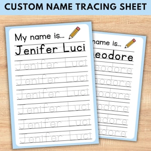 Puede incluir: Dos hojas de rastreo de nombres personalizados de color azul claro. Una dice "My name is... Jenifer Luci" y la otra "name is... eodore". Cada hoja tiene líneas para rastrear los nombres, con un lápiz.