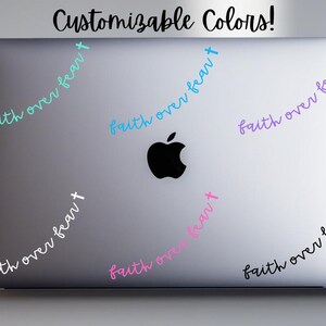 May include: A laptop with the Apple logo has several "faith over fear" decals in various colors. The text "Customizable Colors!" is at the top. The decals are in teal, blue, purple, pink, white, and black.
