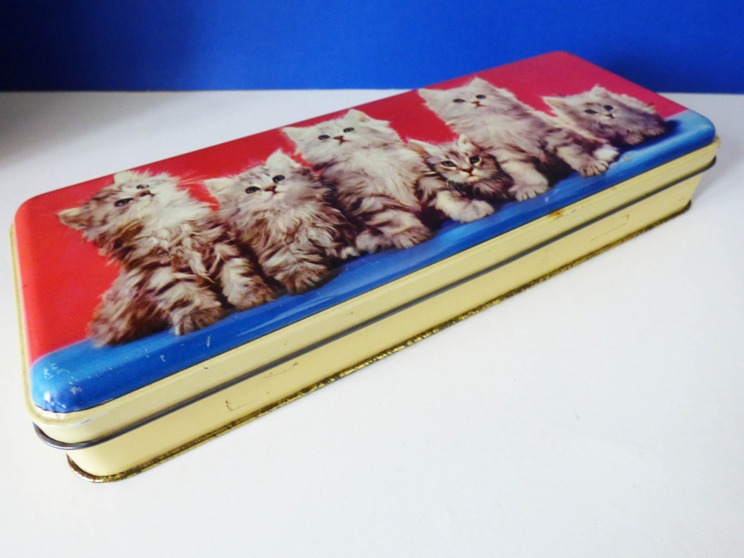 Vintage tin featuring cute kittens