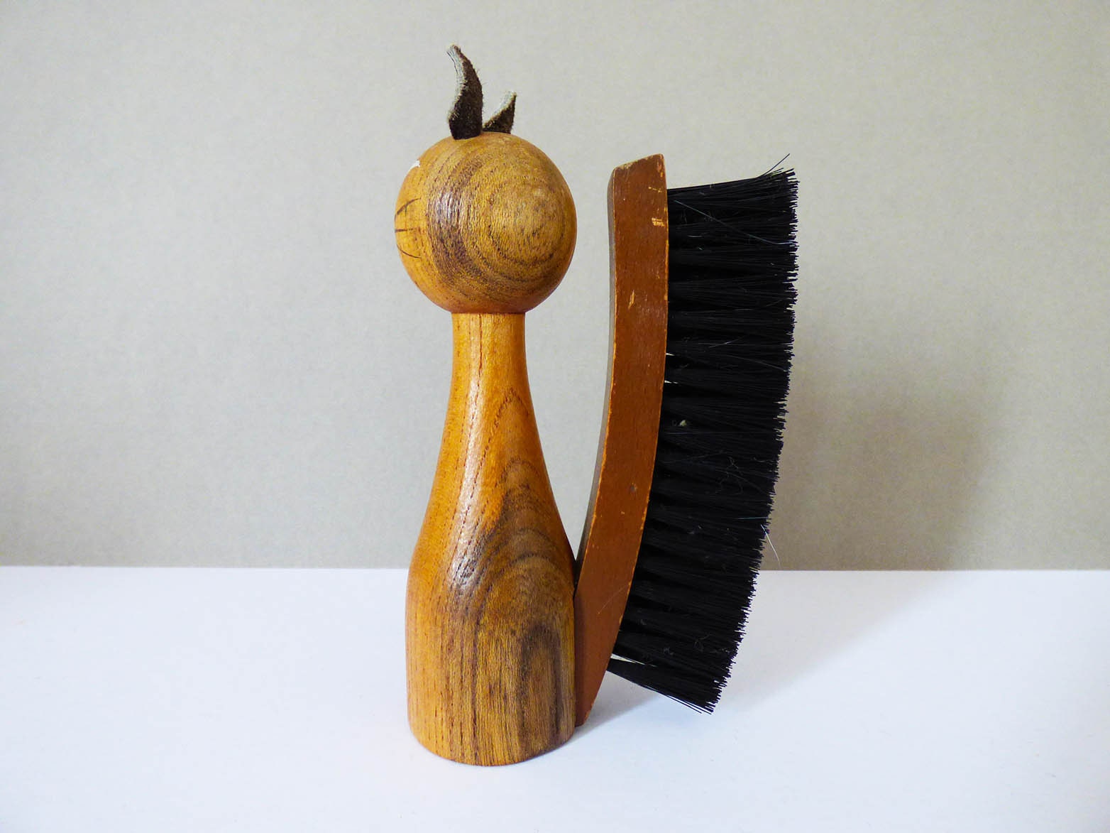 Vintage wooden cat clothes brush