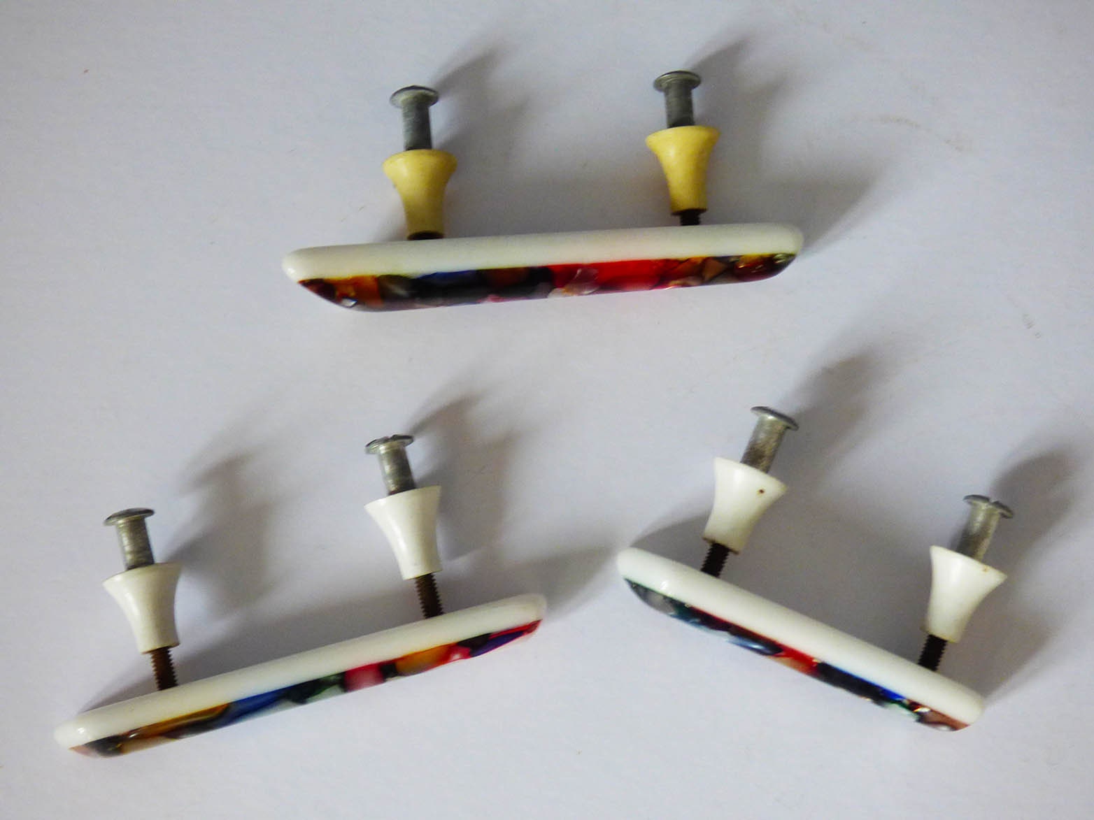 Original 1960's plastic resin cupboard handles