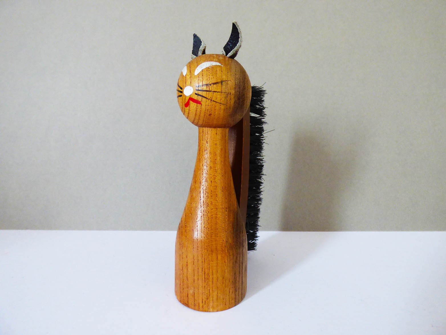 Vintage wooden cat clothes brush