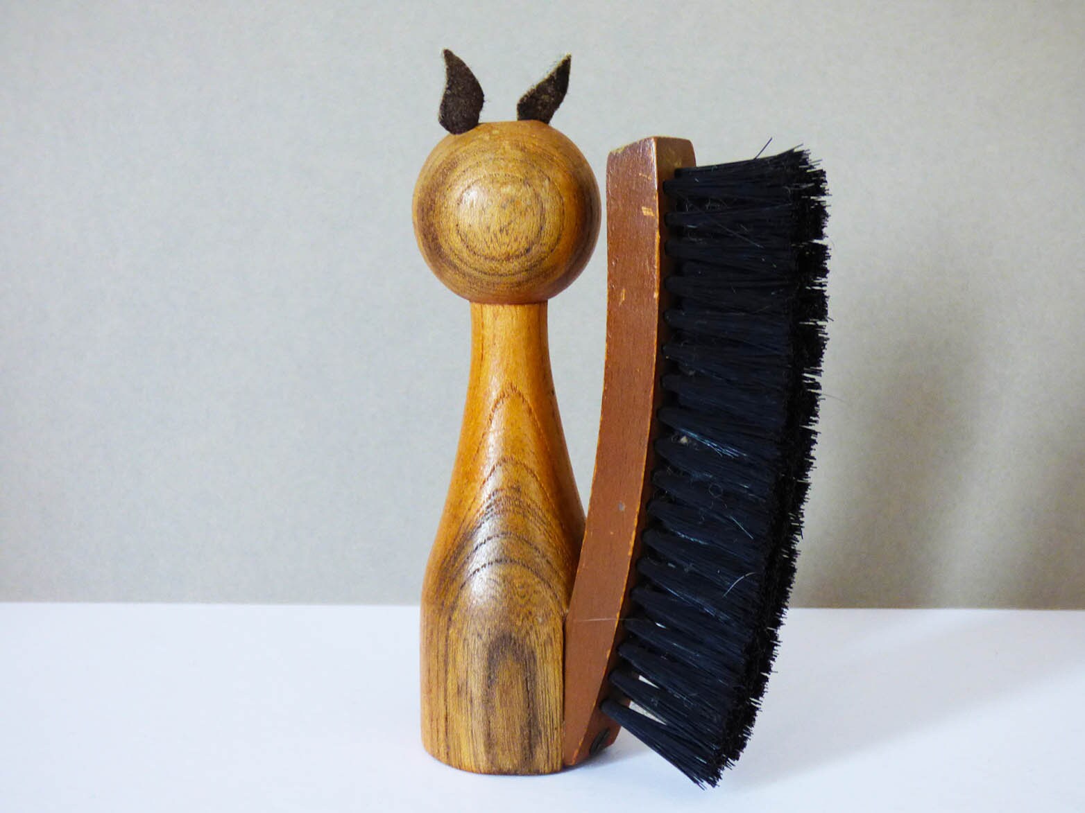 Vintage wooden cat clothes brush