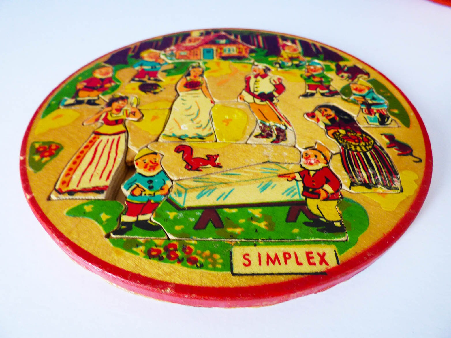 Vintage wooden Simplex people puzzle tray