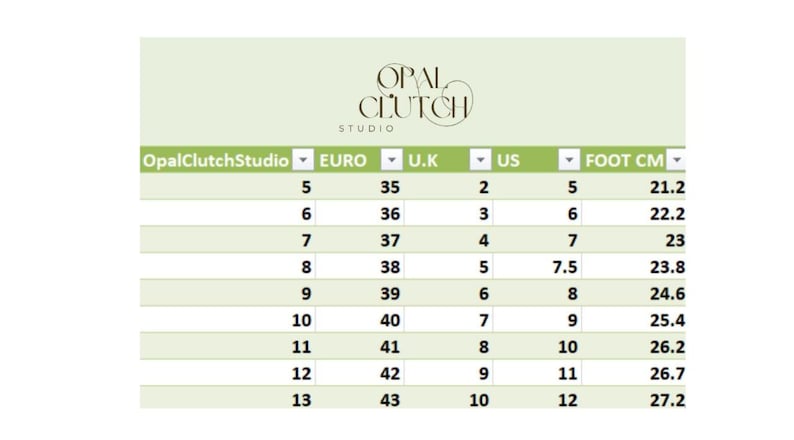 May include: A size chart from Opal Clutch Studio, displaying shoe sizes in Euro, UK, US, and foot centimeters. The chart includes sizes from US size 5 (21.2 cm) to US size 12 (27.2 cm). The Opal Clutch Studio logo is at the top.