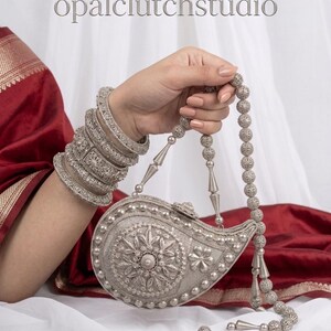 silver and golden diya shaped  paisley metal Clutch | Floral Evening Bag | Rajasthani  Tassel :  6”x4”